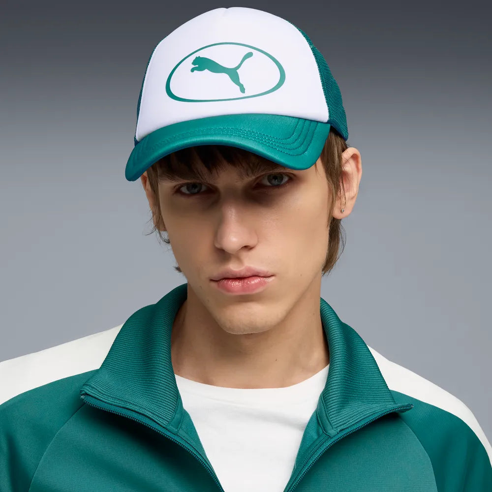 PUMA ESSENTIAL TRUCKER CAP - Emerald Ice/White, lifestyle front view worn by model